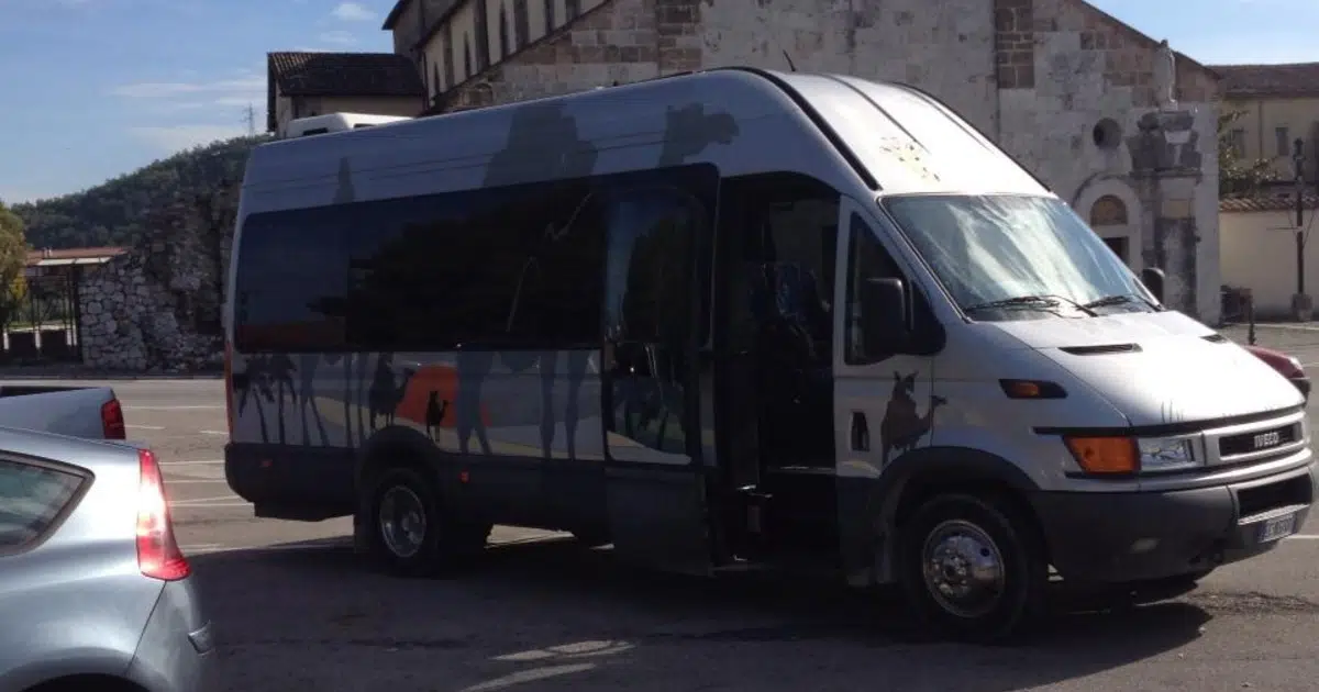 A 15 seater Iveco minibus parked in Reggio