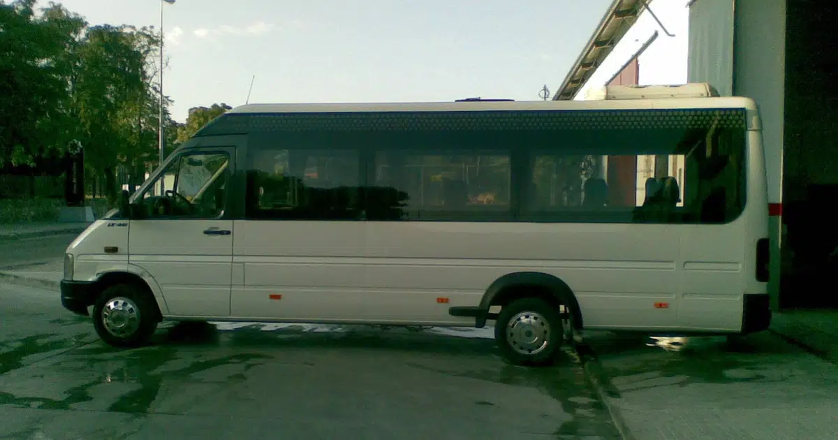 A 22 seater Man Gianino midibus is parked in Córdoba