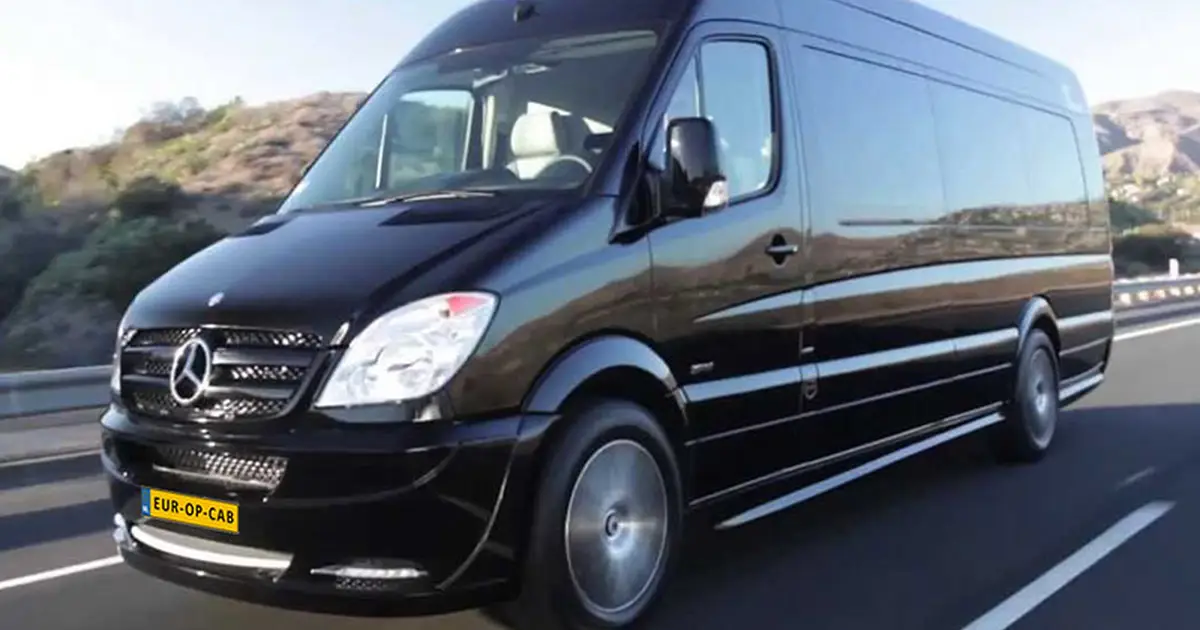 A 16 seater Mercedes Sprinter minibus on the route in Nijmegen