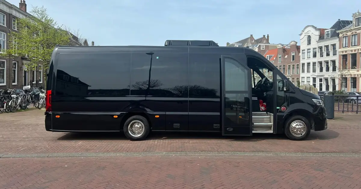 A 17 seater Mercedes Sprinter minibus during a tour in Amsterdam