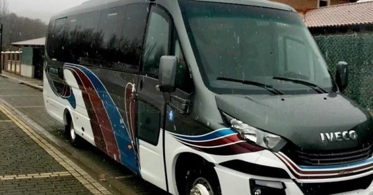 A 16 seater minibus Iveco Sprinter parked in Palencia