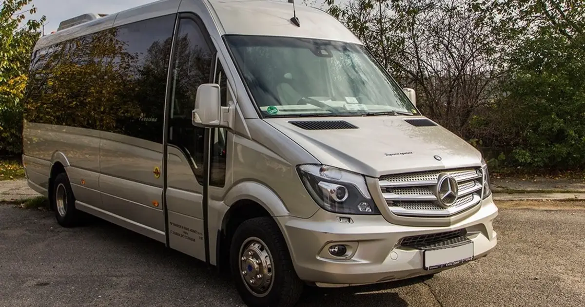 A minibus Mercedes Sprinter with 15 seats on the road in Brussels