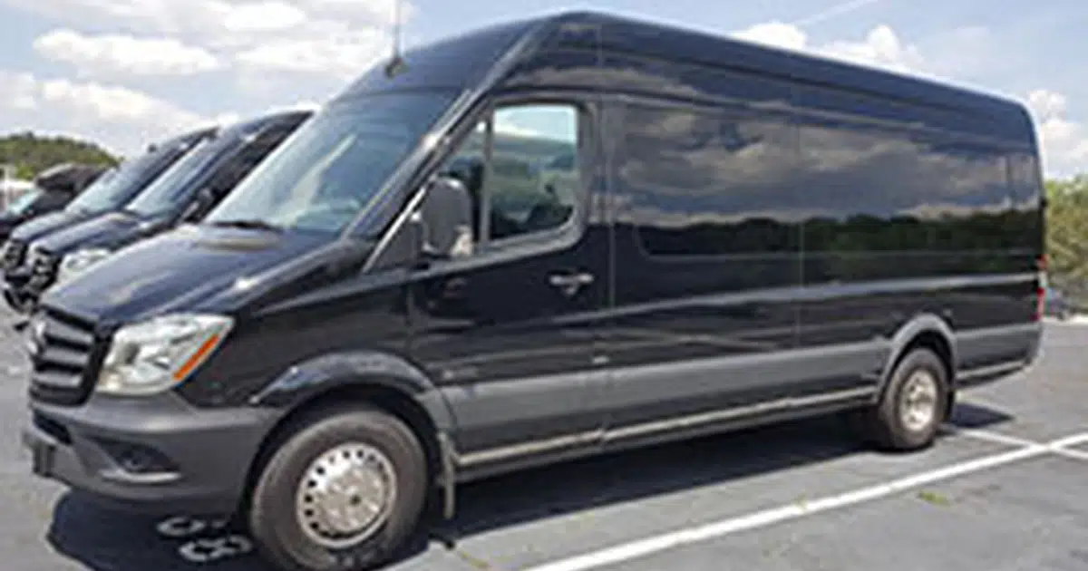 A 16 seater Mercedes Sprinter minibus at a parking in Alpendoorn