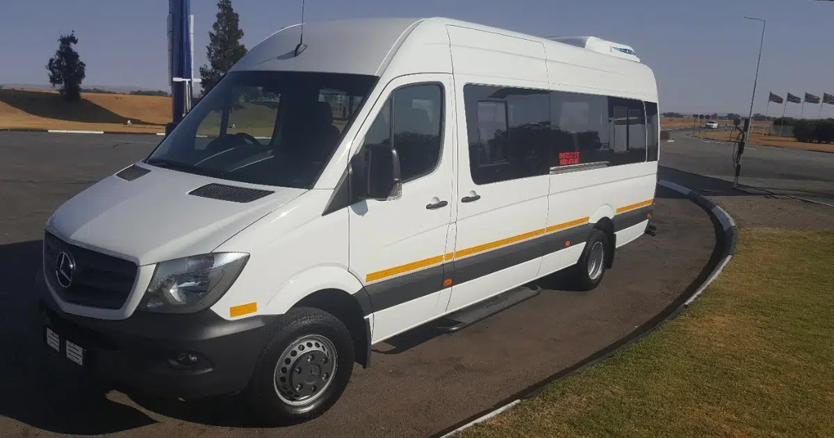 A 16 seater Mercedes Sprinter Minibus on the road in Cape Town