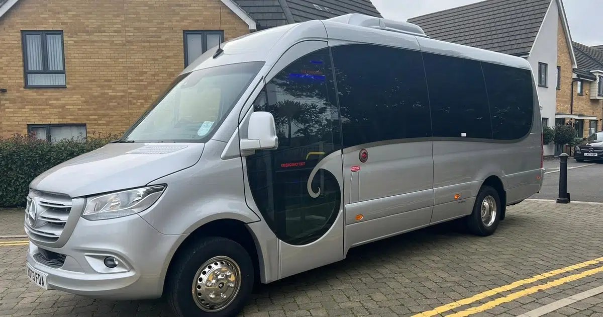 A 16 seater Mercedes Sprinter minibus parked at a street in Blackpool