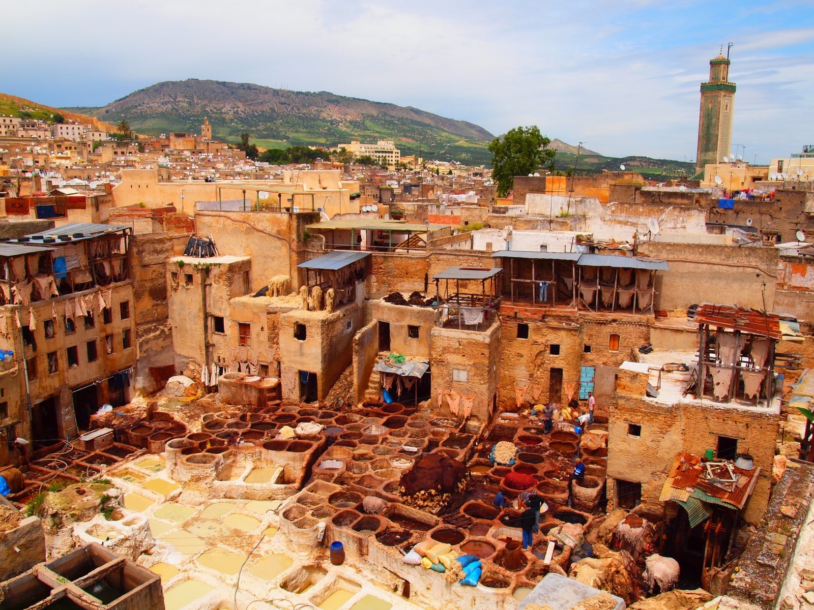 Color-exagerated view of a leather-processing area inside the medina of Fez, Morocco.